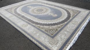A new large Iranian style rug, in grey and cream colours with floral pattern