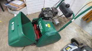 A Suffolk Punch cylinder petrol 14S lawn mower