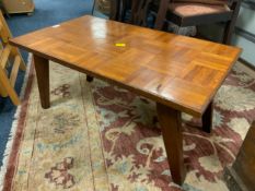 A vintage marquetry style coffee table