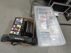 A large collection of CDs, DVDs and collectables to include a CD player