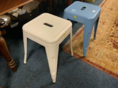 Two metal industrial style low stools