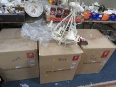 Three boxed cream five branch chandeliers - contents not checked