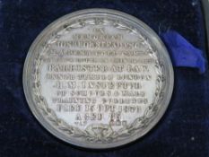 A hallmarked silver cased medallion approx weight 29.7g