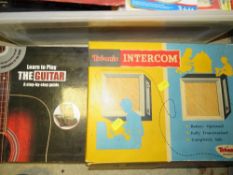 A tray of assorted vintage toys and games