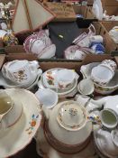 Two boxes of pyrex, old boats, wooden sign etc