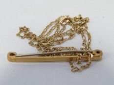 A 9ct brooch with a stainless steel pin approx weight 1.1g together with a hallmarked 9 carat gold