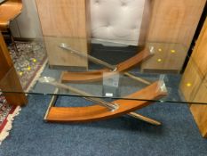 A modern glass topped coffee table