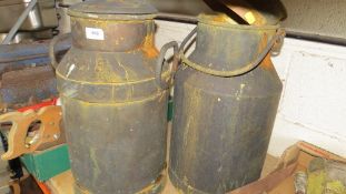 A pair of vintage copper plated urns