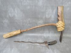 A 19TH CENTURY TRIBAL ART INDONESIAN JAVANESE KRIS KNIFE, with carved handle and a Balinese wooden