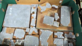 A tray of vintage printing blocks / plates