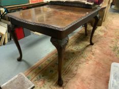 A 20th century walnut dining table