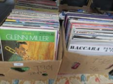 A box of LP records together with a box of 12