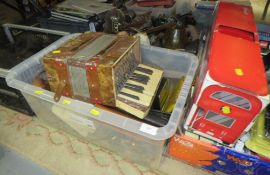 A large quantity of toys and sundries over several trays to include a skateboard, annuals etc