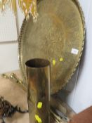 A quantity of brass ware to include a large Egyptian themed charger