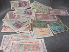A quantity of British military banknotes, including some WW2 allied issues