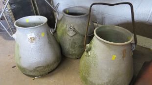 Three vintage milk urns
