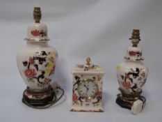 Two Masons Mandalay lamps together with a mantle clock