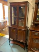 An Edwardian mahogany small display cabinet