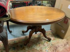 A Victorian mahogany oval tilt top table