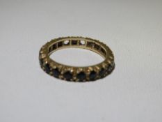 A hallmarked 9 carat eternity ring A/F approx weight 2.4g