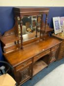 A antique mahogany carved mirror back sideboard