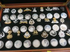 Great British Regiments - A cased set of 52 sterling medals with matching cap badges ( the badges
