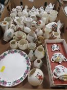 A tray of assorted miniature ceramics and Crested ware
