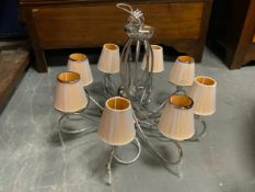 A modern chromed chandelier