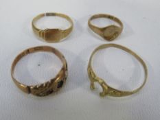 A collection of four assorted 9 carat gold rings approx combined weight 4g
