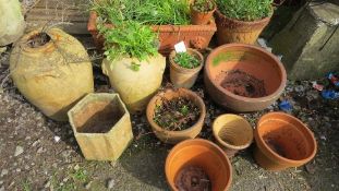 A selection of terracotta garden planters and plant pots