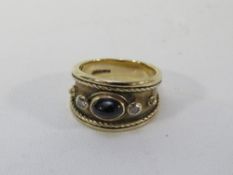 A hallmarked 9 carat gold dress ring approx weight 8.4g