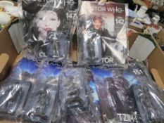 Nine boxed Dr. Who figures with magazines unopened