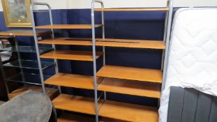 A modern steel framed double display shelving unit