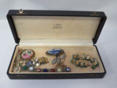A box of assorted costume jewellery to include bracelets, brooches etc