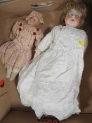 Two antique porcelain headed dolls
