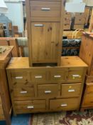 A modern pine multi chest and a bedside cabinet. (2)