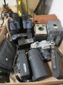 A tray of assorted cameras and binoculars etc