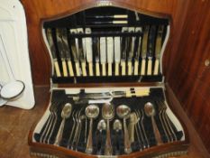 A wooden cased canteen cutlery