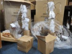 Two boxed bronzed six branch chandeliers - contents not checked
