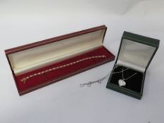 A silver gilt bracelet and silver necklace