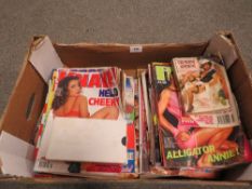 A collection of vintage adult magazines etc.