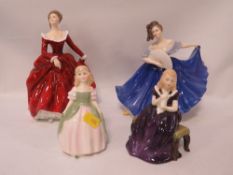 Two Royal Doulton figurines together with two smaller examples