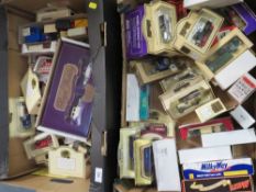 Two trays of assorted boxed model cars to include Lledo examples