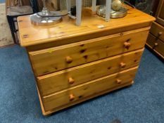 A honey pine three drawer chest