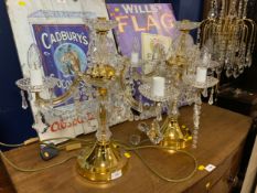 A pair of modern crystal style table lamps and a larger similar floor standing lamp. (3)