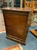 A vintage mahogany collectors cabinet with tambour front