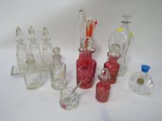 A small tray of assorted glass perfume bottles etc