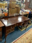 A vintage mahogany dressing table