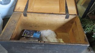 A wooden vintage travel trunk