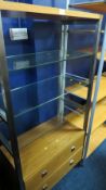 A modern glass / metal display shelf